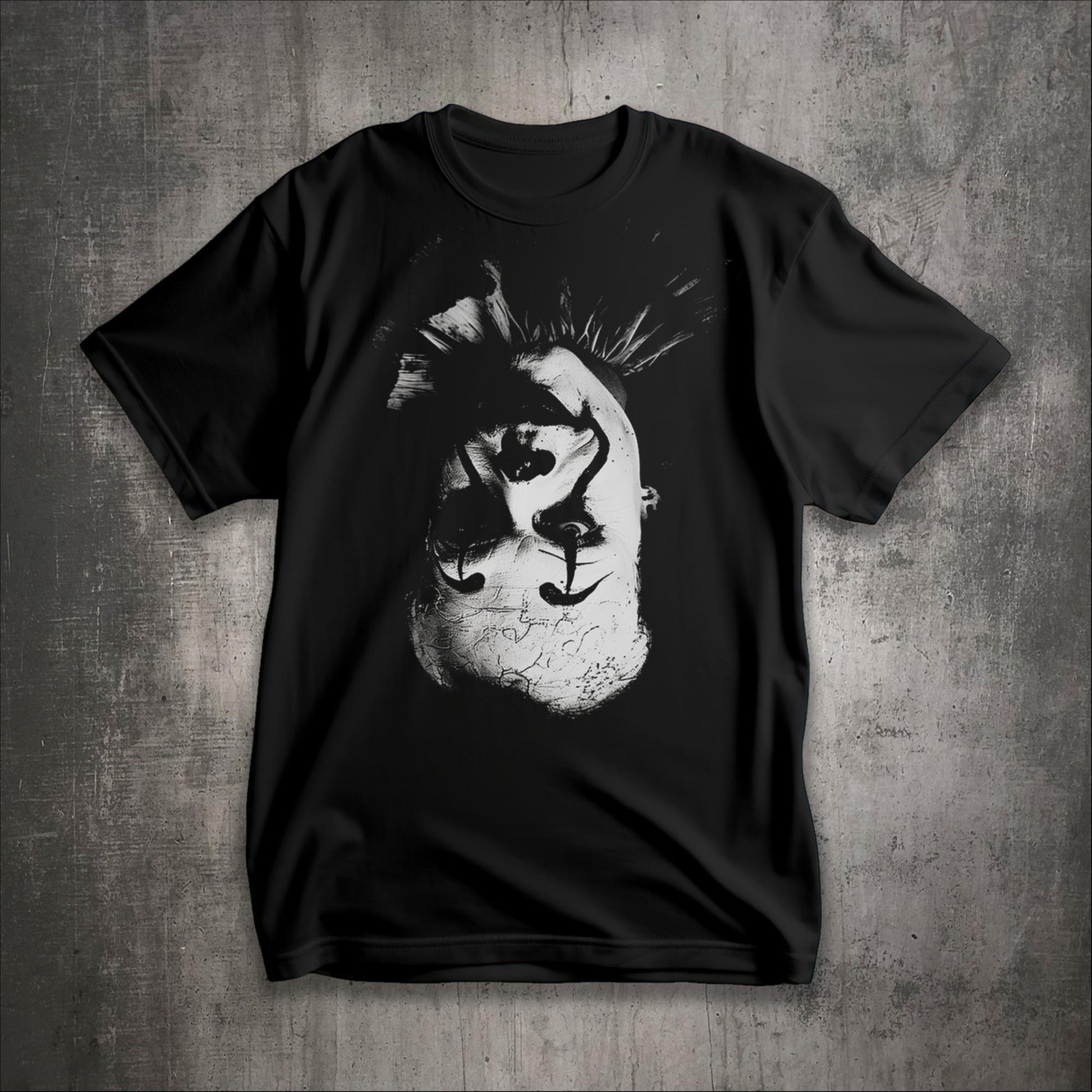 Black unisex graphic tee of a black & white photo of an upside down clown face